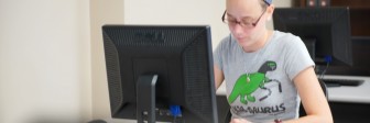 A GED student works on her computer skills